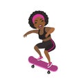 Happy Afro-American girl riding skateboard. Sportive African skateboarding young woman