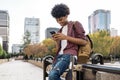 Happy Afro Boy Using Phone Royalty Free Stock Photo