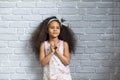 Happy afro girl with shopping bags Royalty Free Stock Photo