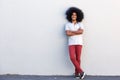 Happy afro man standing with arms crossed Royalty Free Stock Photo