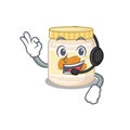 Happy almond butter mascot design style wearing headphone