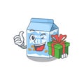 Happy almond milk character having a gift box