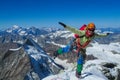 Happy alpine climber on snow mountain ridge Royalty Free Stock Photo