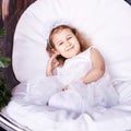 Happy amazed female kid emotion. Dreaming child studio portrait. Young girl Royalty Free Stock Photo