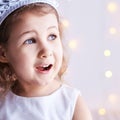 Happy amazed female kid emotion. Suprised child portrait. Young girl imagine Royalty Free Stock Photo