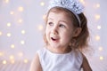 Happy amazed female kid emotion. Suprised child studio portrait. Young girl Royalty Free Stock Photo