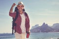 Happy american hipster tourist at Ipanema beach at Rio de Janeiro