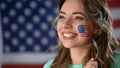 Happy American woman supporting political candidate, celebrating victory closeup Royalty Free Stock Photo