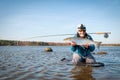 Happy angler with big sea trout Royalty Free Stock Photo