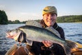 Happy angler with fresh caught big walleye Royalty Free Stock Photo