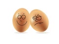 Happy and angry eggs Royalty Free Stock Photo