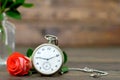 Happy Anniversary card with bouquet of red roses and pocket watch Royalty Free Stock Photo