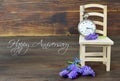 Happy Anniversary card with pocket watch and flowers Royalty Free Stock Photo