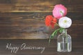 Happy Anniversary card with poppy flowers in vase Royalty Free Stock Photo