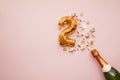 Happy 2nd anniversary party. Champagne bottle with gold number balloon.