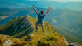 Happy anonymous man with arms raised jumping over the top of the mountain