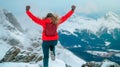 Happy anonymous woman with arms raised jumping over the top of the mountain