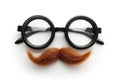 Happy april fool\'s day and funny pranks concept with a pair of comical glasses with bushy eyebrows and thick mustache