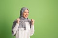 Happy arab woman in hijab. Portrait of smiling girl, posing at studio background