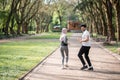 Happy arabian couple in active wear jogging at park