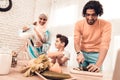Happy Arabian Family Cooking Food in Kitchen