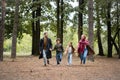 Happy arabian family holding hands while Royalty Free Stock Photo