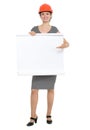 Happy architect woman pointing on blank flipchart