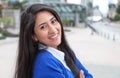 Happy argentinian woman in the city Royalty Free Stock Photo