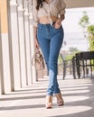 Happy Asia woman in bright skinny jeans, sky blue jeans Royalty Free Stock Photo