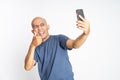 Happy asian bald man showing thumbs up when selfie Royalty Free Stock Photo