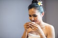 woman smell hot green tea in spa Royalty Free Stock Photo