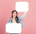 Woman smiling excited wear denims holding empty speech bubble sign Royalty Free Stock Photo