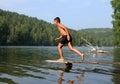 Happy asian boy diving in lake Royalty Free Stock Photo