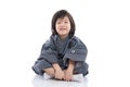 Happy asian boy in kimono sitting Royalty Free Stock Photo