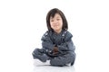 Happy asian boy in kimono sitting Royalty Free Stock Photo