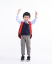 Happy asian boy wearing student backpack isolated on white