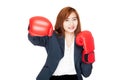 Happy Asian businesswoman punch with boxing glove Royalty Free Stock Photo