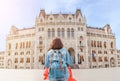 Asian casual woman student enjoying great view of the Parliament building in Budapest city, travel in Europe concept Royalty Free Stock Photo