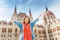 Asian casual woman student enjoying great view of the Parliament building in Budapest city, travel in Europe concept Royalty Free Stock Photo