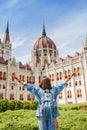 asian casual woman student enjoying great view of the Parliament building in Budapest city, travel in Europe concept Royalty Free Stock Photo