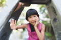 Happy Asian chidren playing at playground