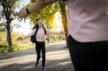 Happy asian child daughter running to hug her mother with love after back school ,schoolgirl with stretched arms at primary school Royalty Free Stock Photo
