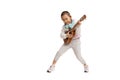 Happy Asian child girl play ukulele, isolate on white