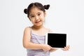 Happy Asian child holding tablet computer Royalty Free Stock Photo