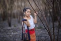 Happy asian child playing together on playground.