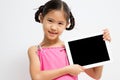 Happy Asian child with tablet computer Royalty Free Stock Photo