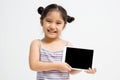 Happy Asian child with tablet computer Royalty Free Stock Photo