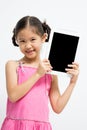 Happy Asian child with tablet computer Royalty Free Stock Photo