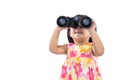 Happy Asian Chinese little girl holding binoculars Royalty Free Stock Photo