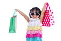 Happy Asian Chinese Little Girl Holding Shopping Bags Royalty Free Stock Photo